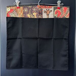 NWT Pair of Cloth Napkins from Africa. Plain black with printed lined edge 16.5”